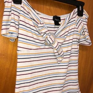 Off the shoulder cropped shirt.